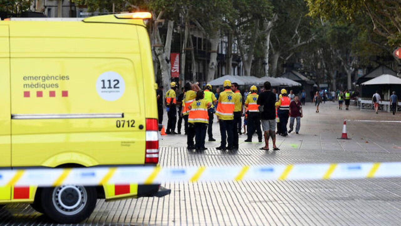 Van runs into crowd in Barcelona tourist area