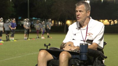 Coach Andrew Goodyear looks on at the Abacoa Football fields in Jupiter
