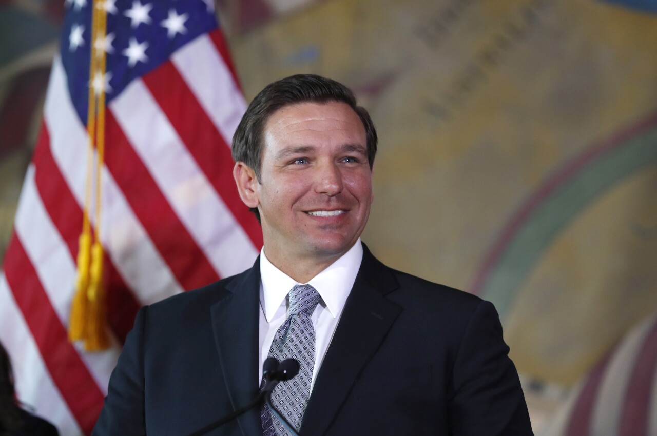 Ron DeSantis smiles during Jan. 9, 2019, news conference in Miami