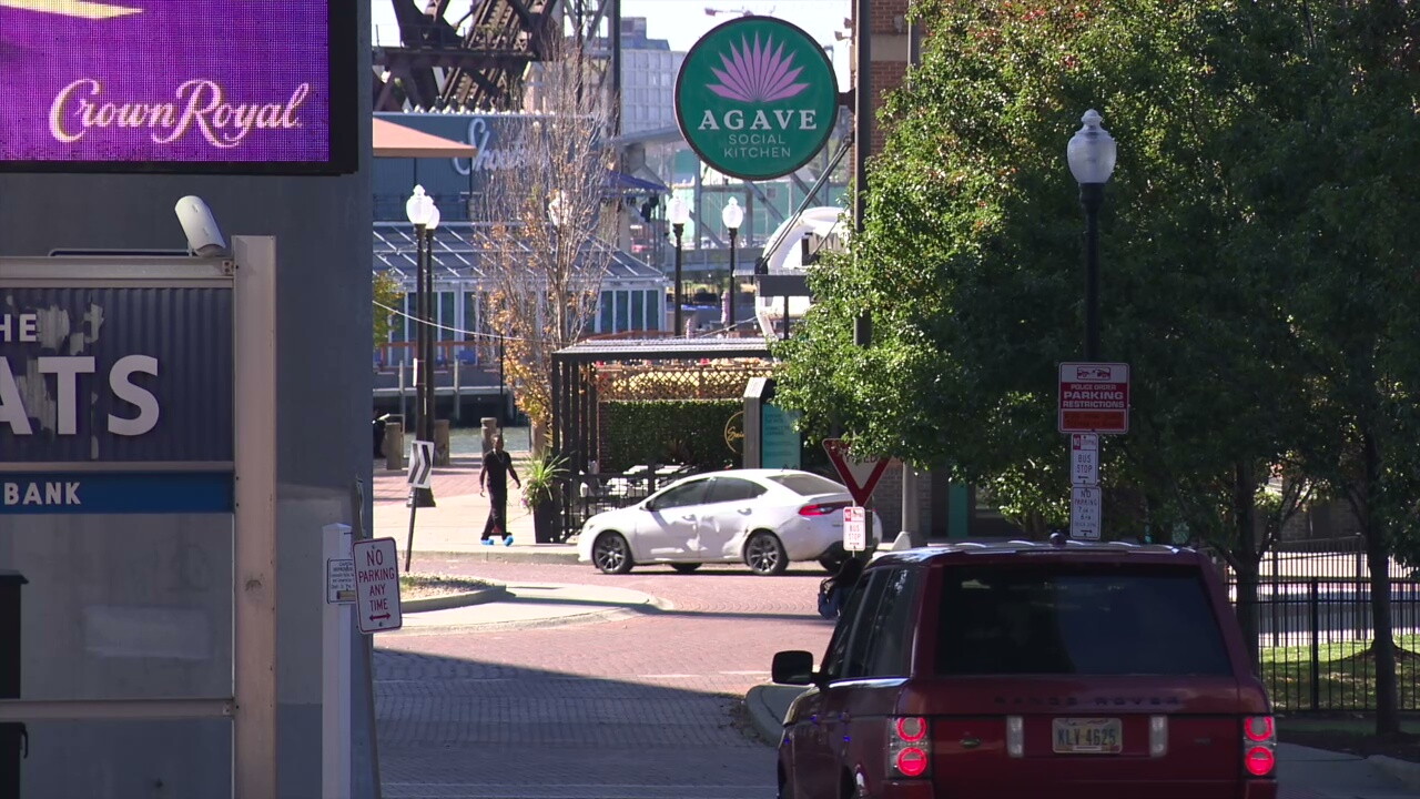 Patrons drive into the Flats East Bank district along the Cuyahoga River.