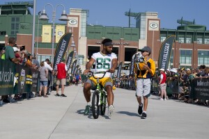Malik Taylor takes part in riding bikes to practice, a Packers tradition