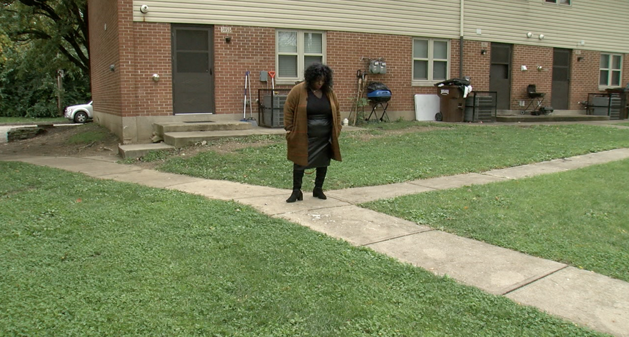 LaVonda Evans stands at the spot where her 16-year-old son Ladarius collapsed and died June 17 in Walnut Hills