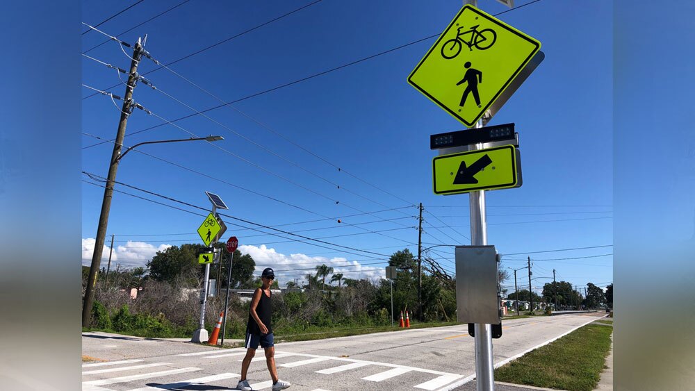 Flashing-crosswalk-installed-at-site-of-fatal-Duke-Energy-Trail-bicycle-crash-1.jpg