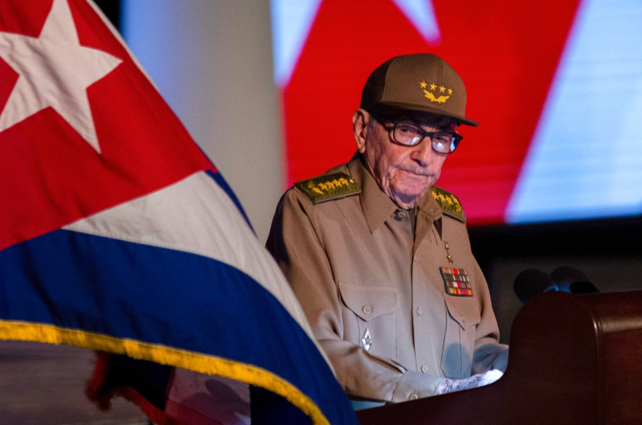 Former Cuban President Raul Castro looks at the Cuban flag during his speech at the event celebrating the 65th anniversary of the triumph of the revolution in Santiago, Cuba, Jan. 1, 2024.