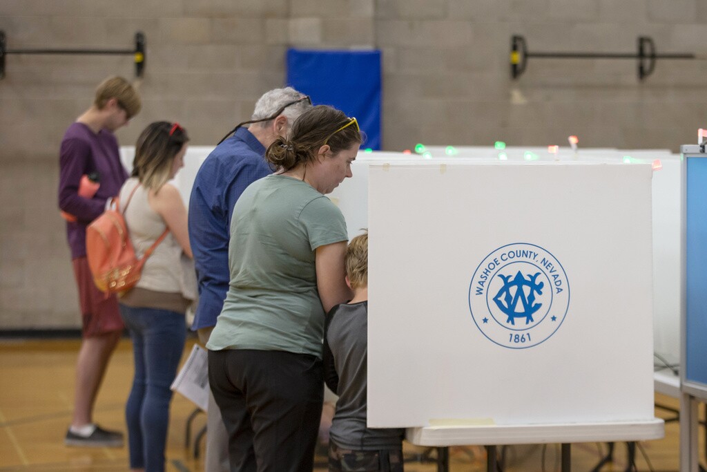 Voters cast their ballots in the Nevada primary election in Reno.