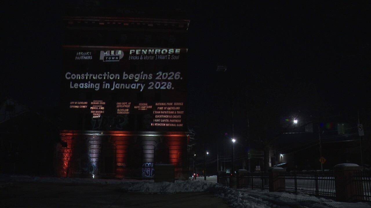 The developers of the Warner & Swasey project in Cleveland's Midtown projected a celebratory message on the building Thursday evening.