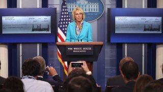 Education Secretary Betsy DeVos accepting Donald Trump's donation