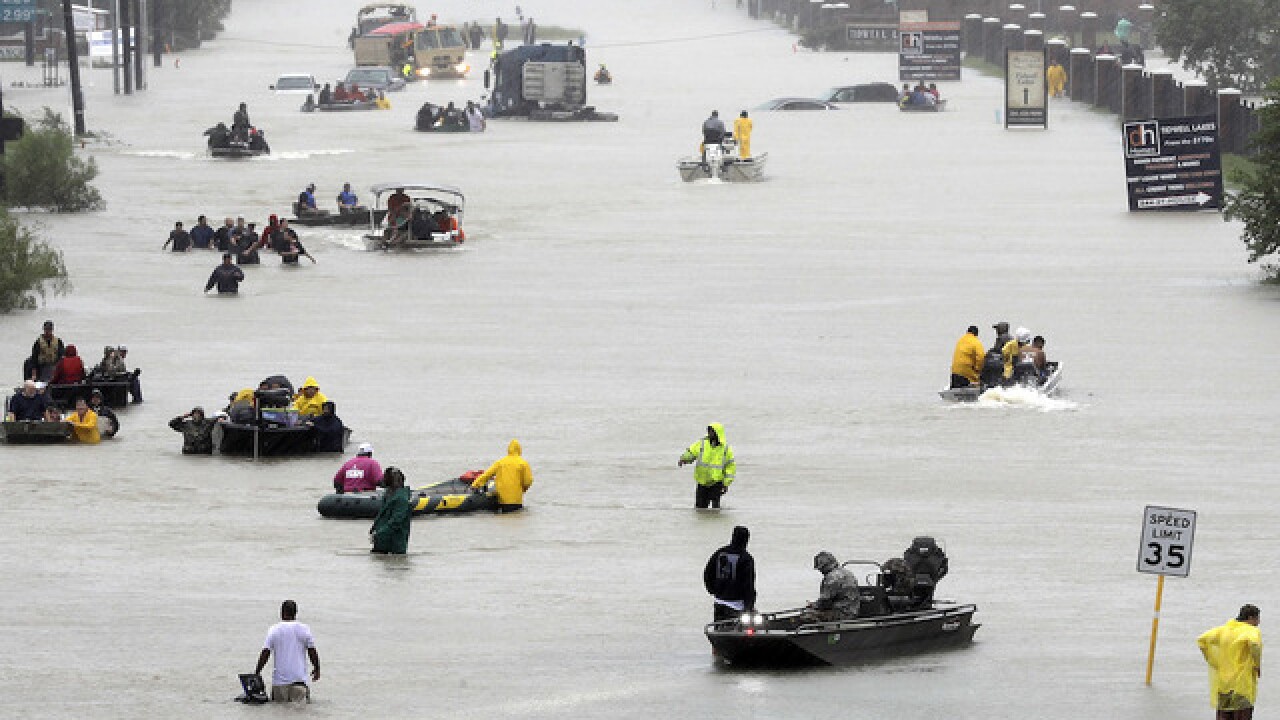Harvey rescuers find shivering toddler clinging to body of drowned mother