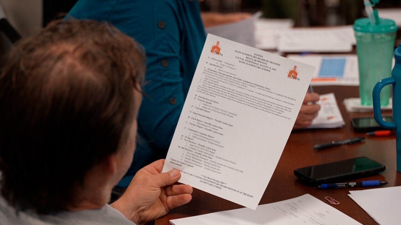 Brock looking at paper