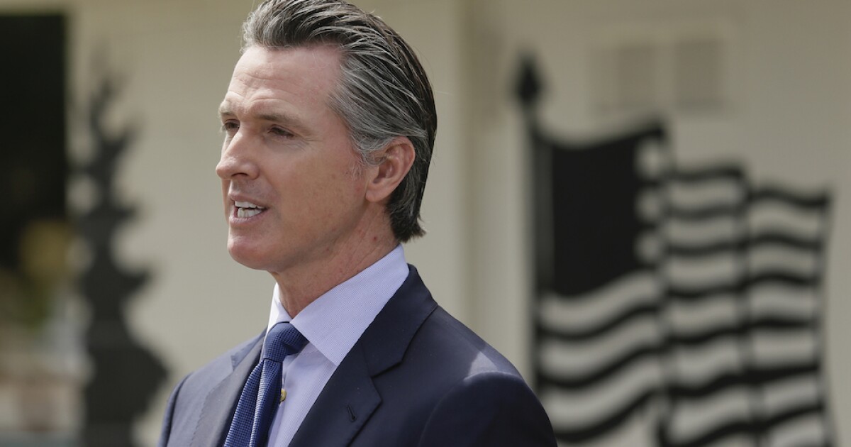 Newsom proposes pausing expansion of health care to immigrants