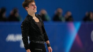 Andrew Torgashev of the United States competes during the men's figure skating short program at the 2026 Winter Olympics, in Milan, Italy, Tuesday, Feb. 10, 2026. 