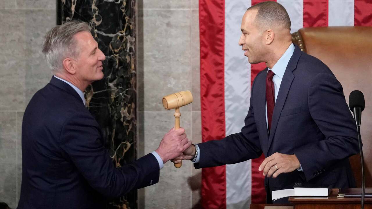 Incoming House Speaker Kevin McCarthy of Calif., receives the gavel from House Minority Leader Hakeem Jeffries of N.Y., on the House floor at the U.S. Capitol in Washington, early Saturday, Jan. 7, 2023.