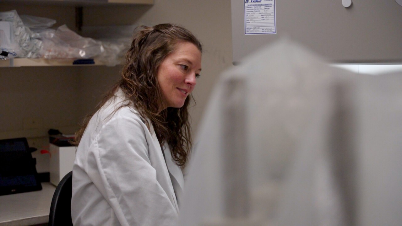 Jennifer working with student.jpg