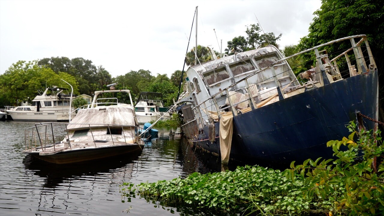 Abandoned boats sitting in the Glades RV Park Marina.