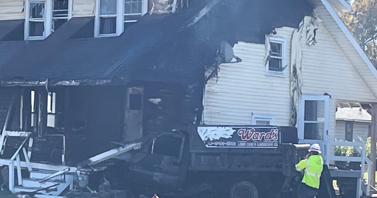 1 dead, another injured after dump truck crashes into house, both catch ...