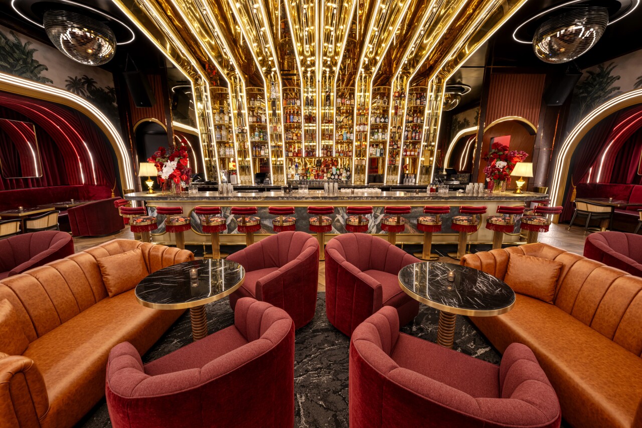Inside of 'Tell Your Friends' with a view to the bar area.