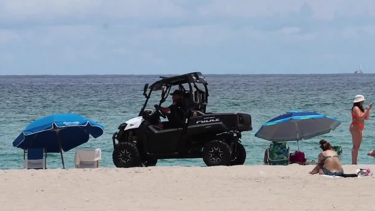 Officer Joseph Hoffman of the Riviera Beach Police Department patrols the beach, June 2022 (1).jpg