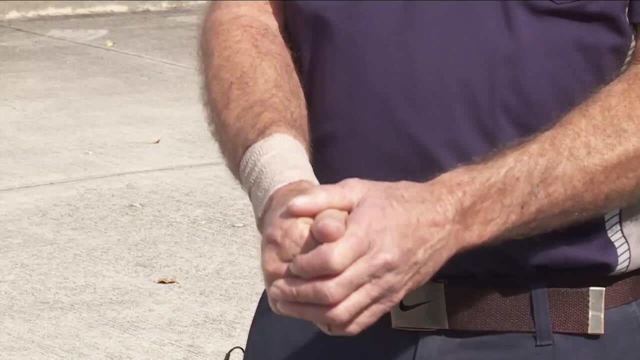 Lynn Segebart bandage on arm from Cumberland Farms stabbing attack