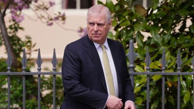 FILE - Britain's Andrew Mountbatten-Windsor, formerly known as Prince Andrew, looks round as he leaves after attending the Easter Matins Service at St. George's Chapel, Windsor Castle, England, April 20, 2025. 