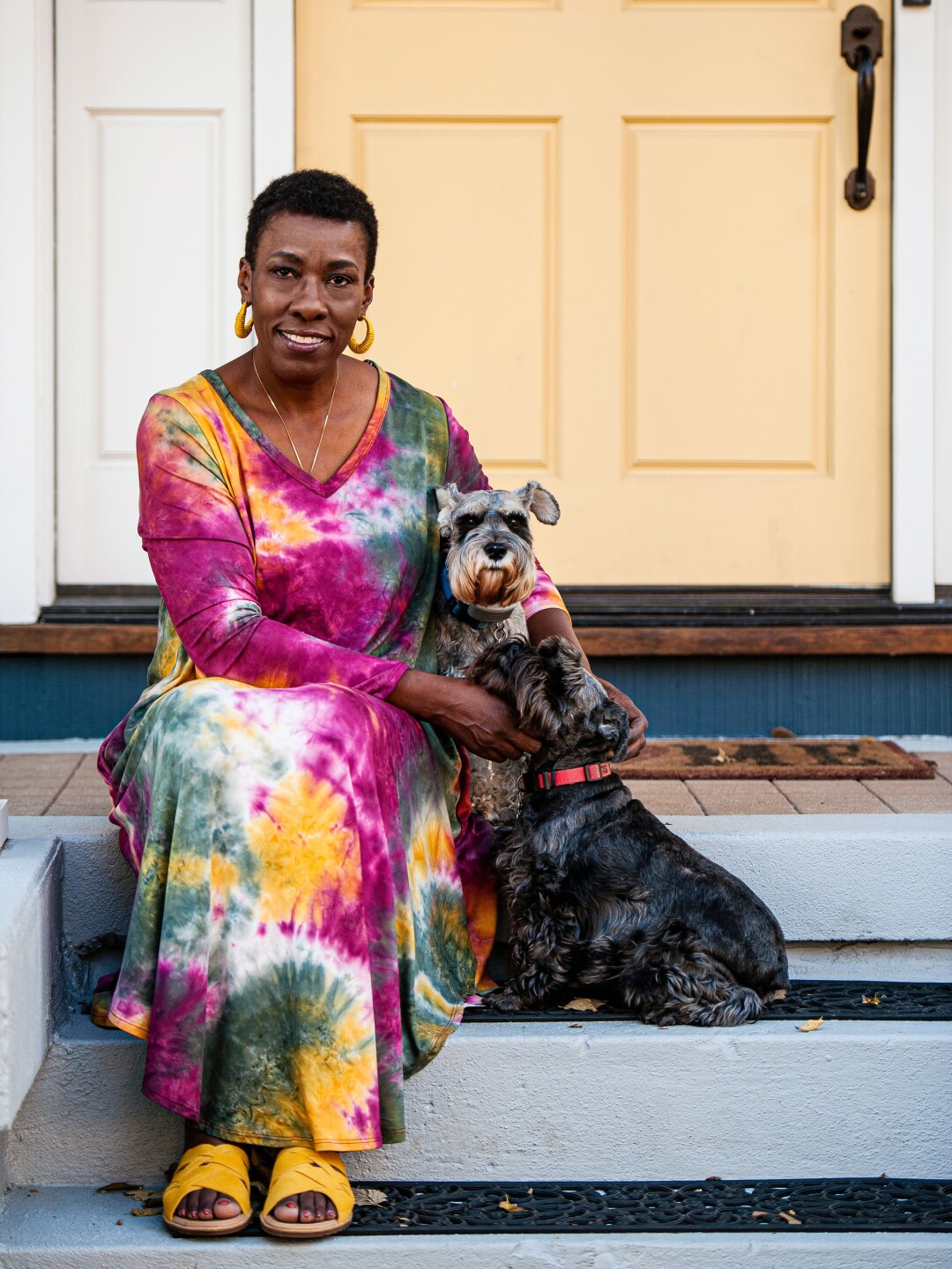 Venus Kent poses for a picture with her two dogs.