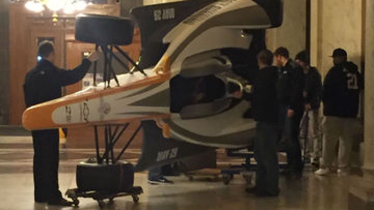 PHOTOS: Crews put IndyCar inside Statehouse