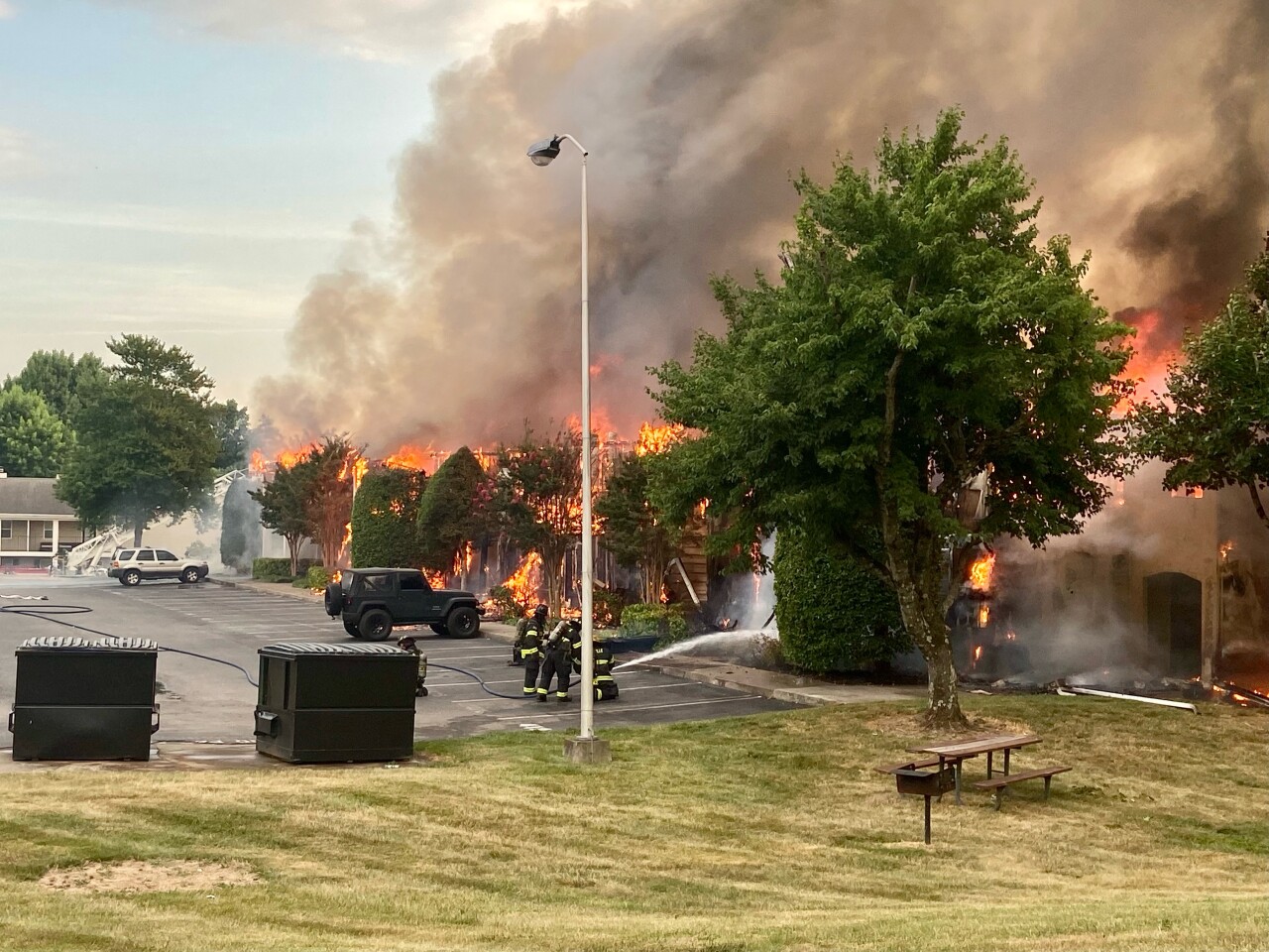 crews fight the June 25 fire at British Woods Apartments