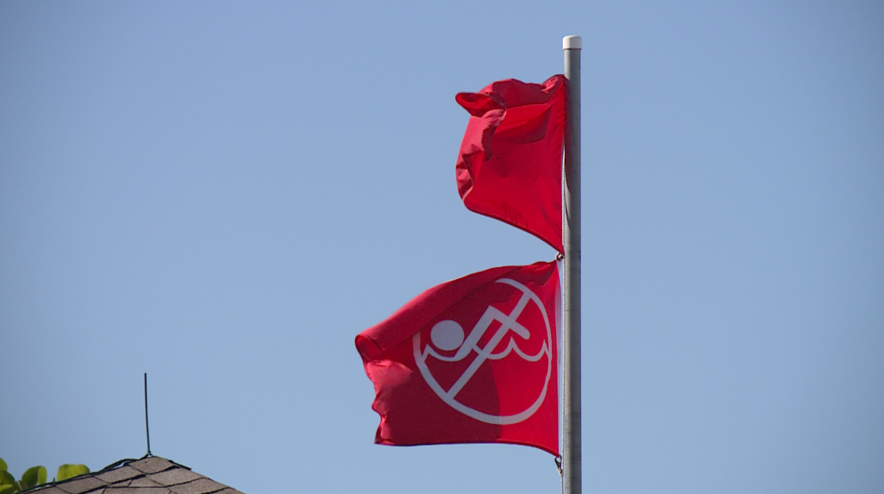 Double red flags Juno Beach