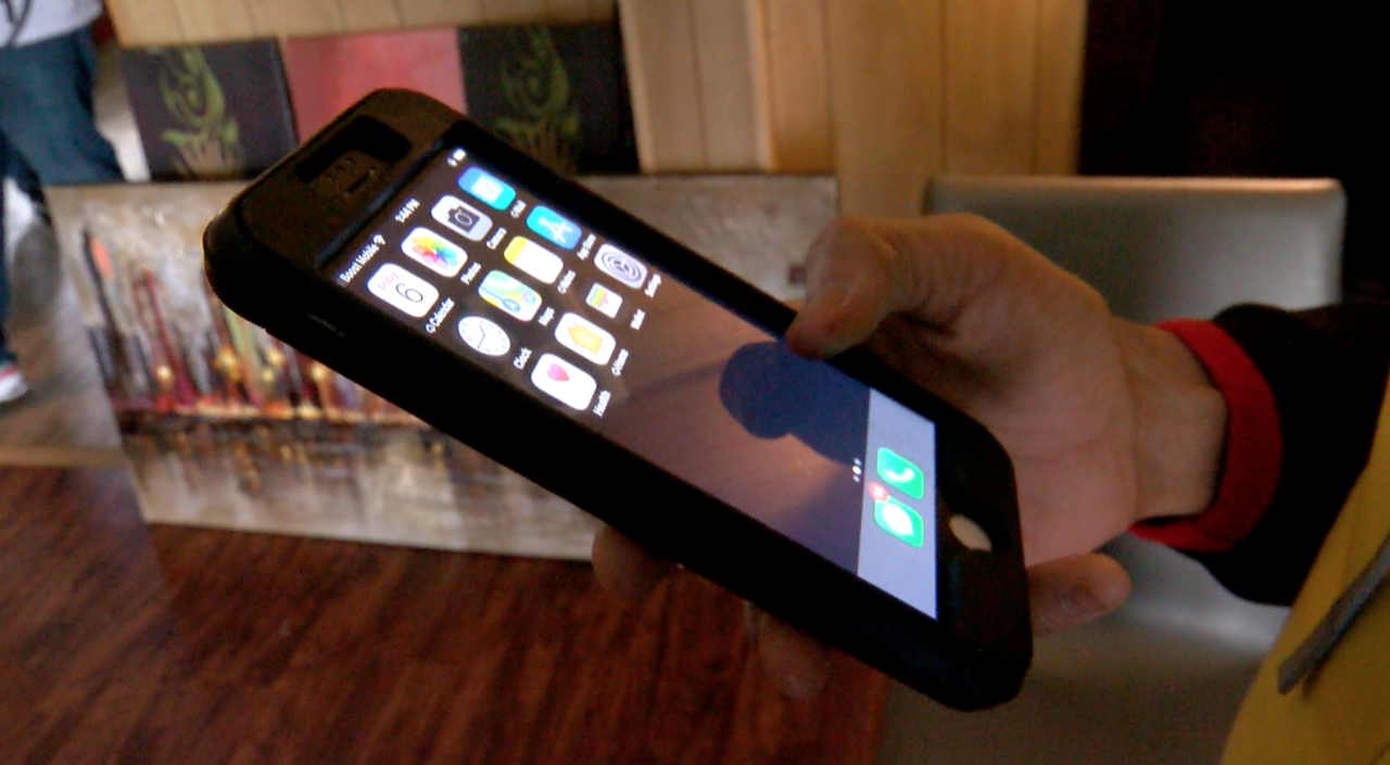 Keyon Davis-Washington with his phone