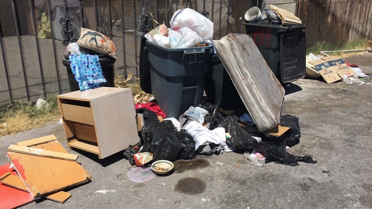 UPDATE Republic Services cleans up piledup trash in local neighborhood