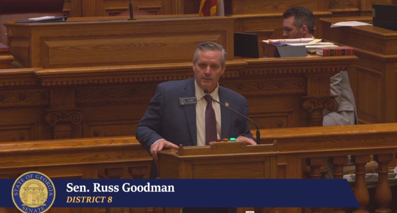 State Sen. Russ Goodman calls for a moment of silence after the death of Caleb Abney