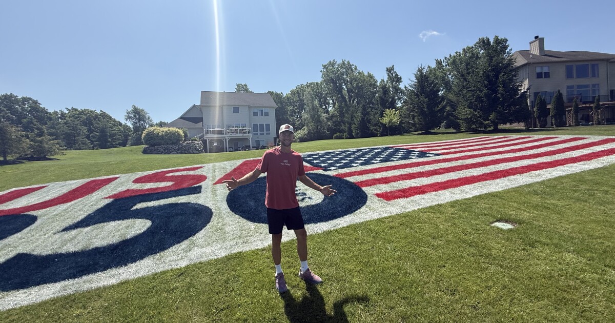 Clarkston man paints giant flag on lawn to celebrate America's 250th birthday