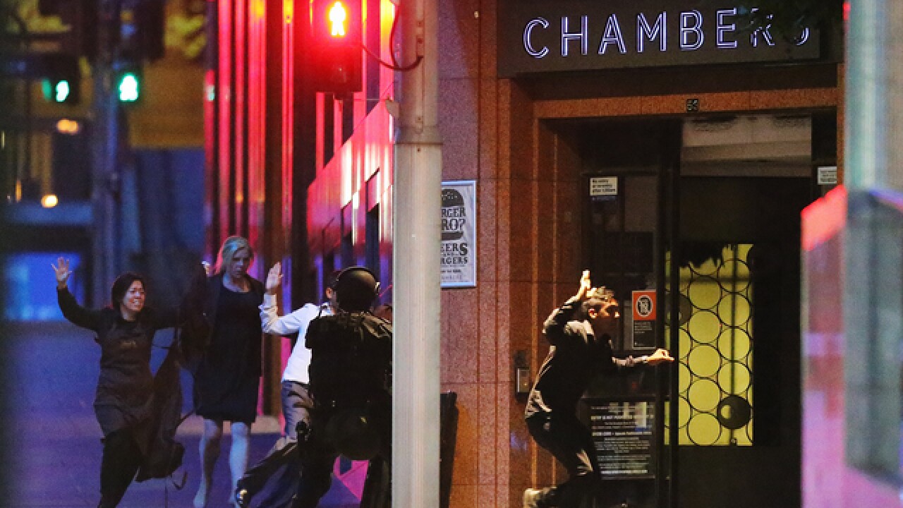 PICS: Standoff at Sydney cafe