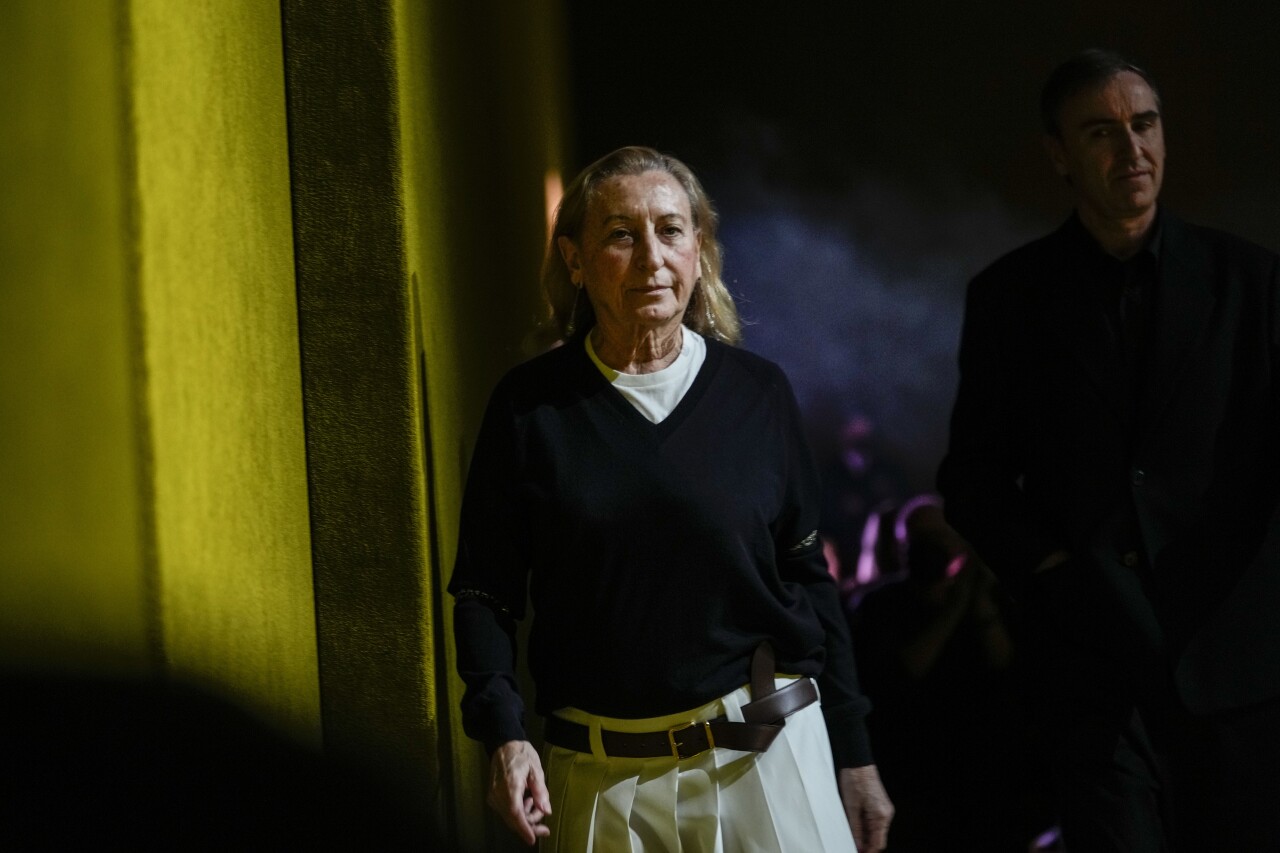 Miuccia Prada departs after the Prada Fall/Winter 2022-2023 fashion collection, unveiled during the Fashion Week in Milan, Italy, Thursday, Feb. 24, 2022. (AP Photo/Luca Bruno)