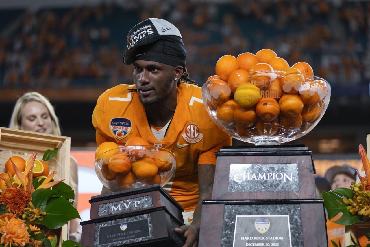 Tennessee Volunteers QB Joe Milton holds 2022 Orange Bowl MVP trophy