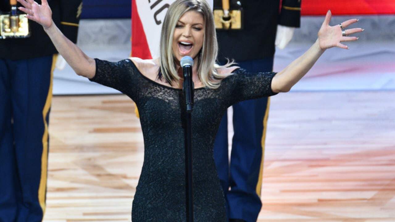 Fergie says she tried her best in statement on national anthem performance