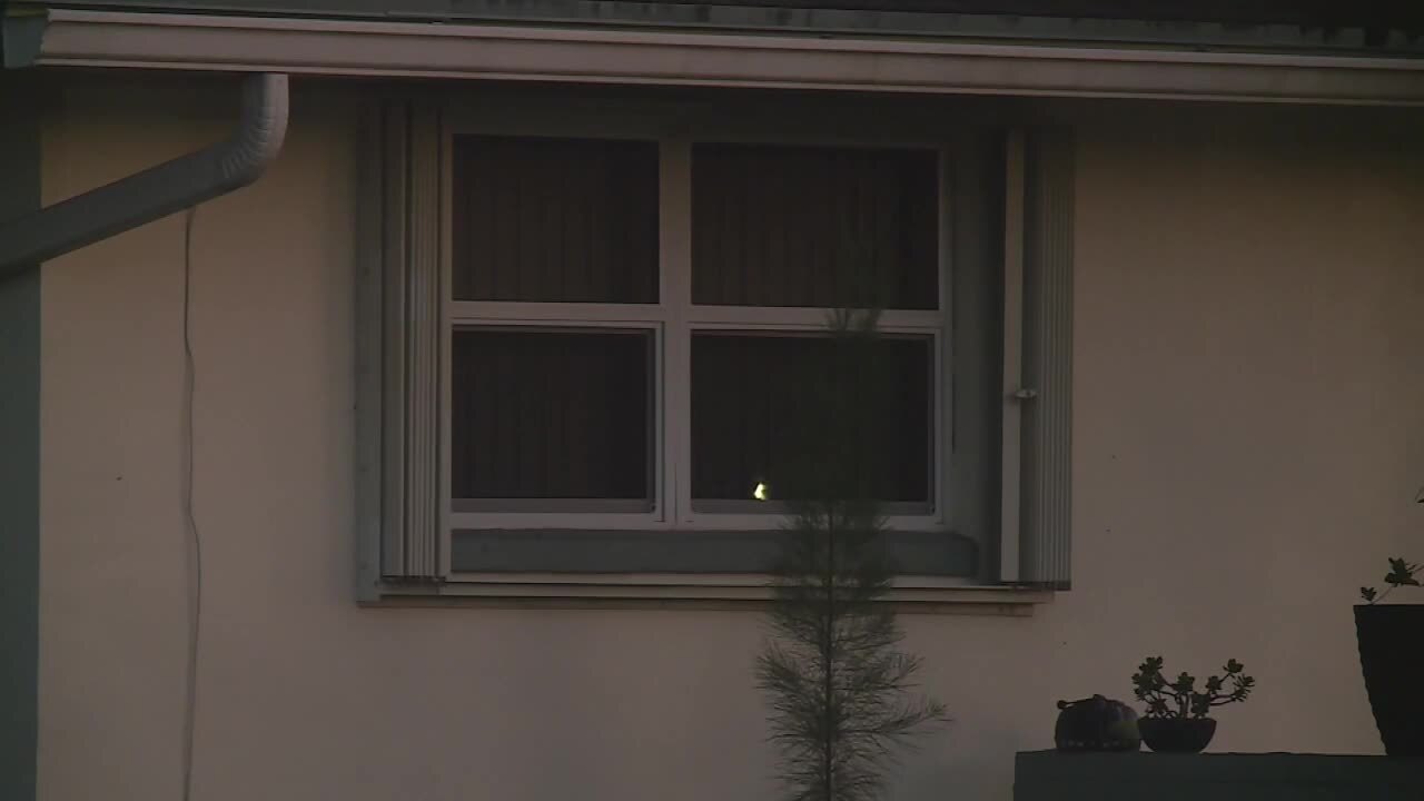Window of Royal Palm Beach home where elderly abuse and neglect took place