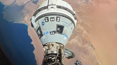 his photo provided by NASA shows the Starliner spacecraft docked to the Harmony module of the International Space Station.