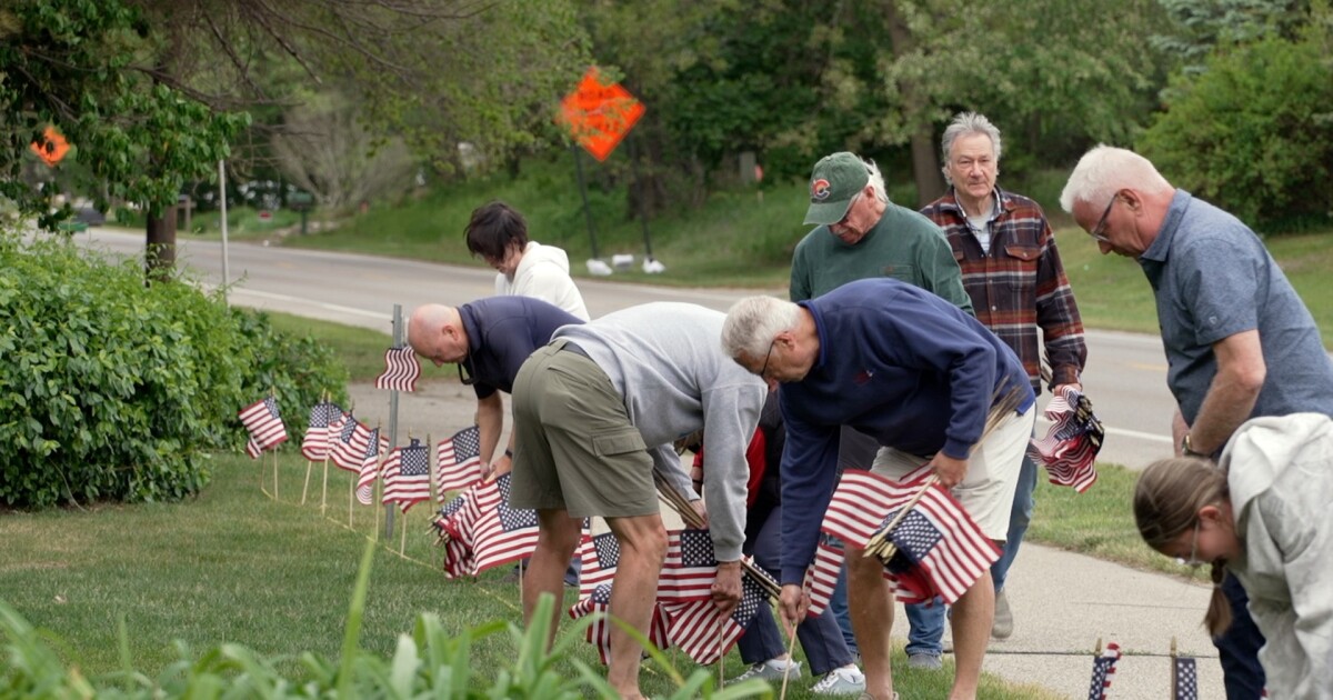 Flags line Ottawa Beach Road as Lakeshore neighbors honor fallen ahead of Memorial Day