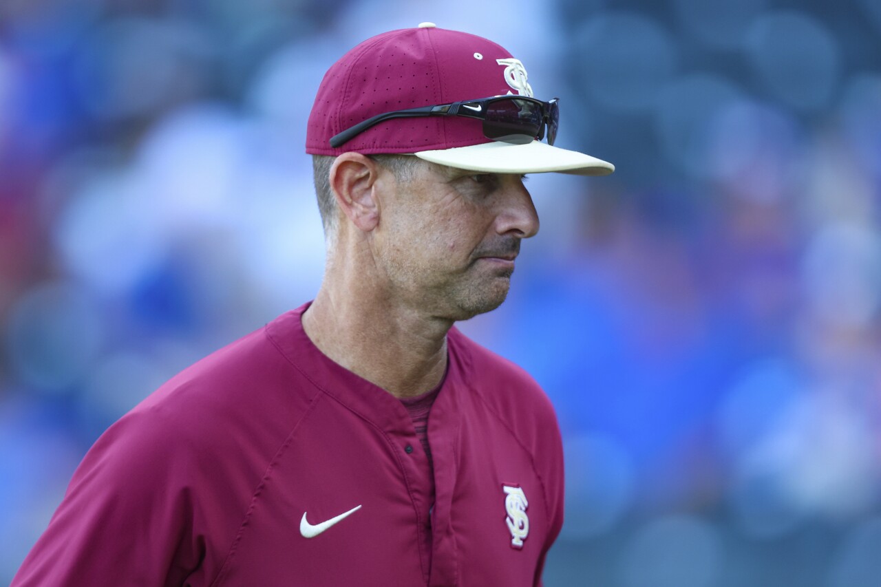 Florida State Seminoles coach Link Jarrett walks to dugout, May 2, 2023