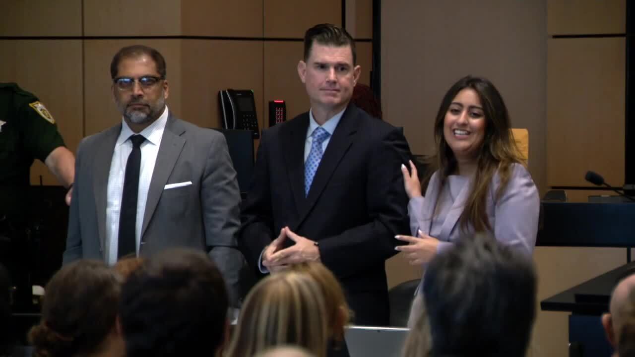 Tim Ferriter stands with his attorneys on first day of jury selection, Sept. 29, 2023