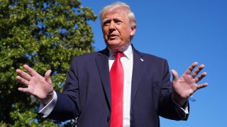 President Donald Trump speaks with reporters before departing on Marine One from the South Lawn of the White House, Saturday, April 11, 2026, in Washington.