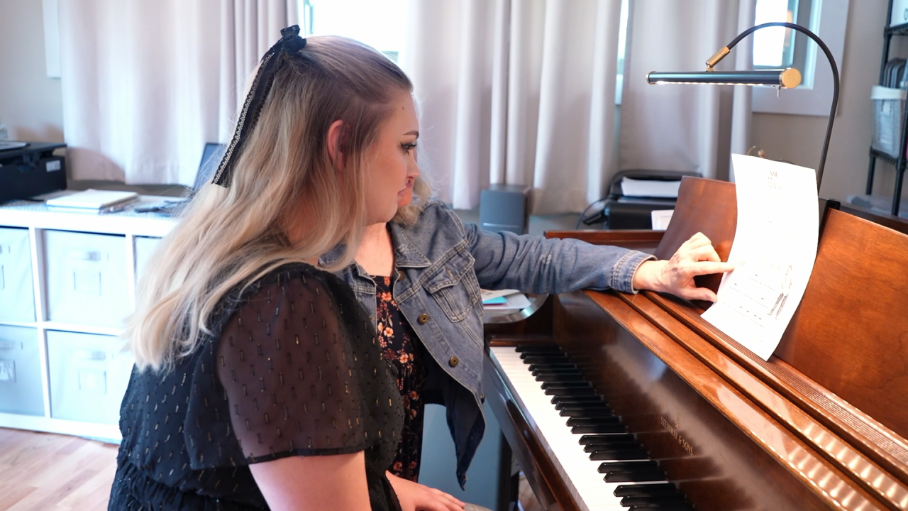 Reporter Mack Carmack learns piano