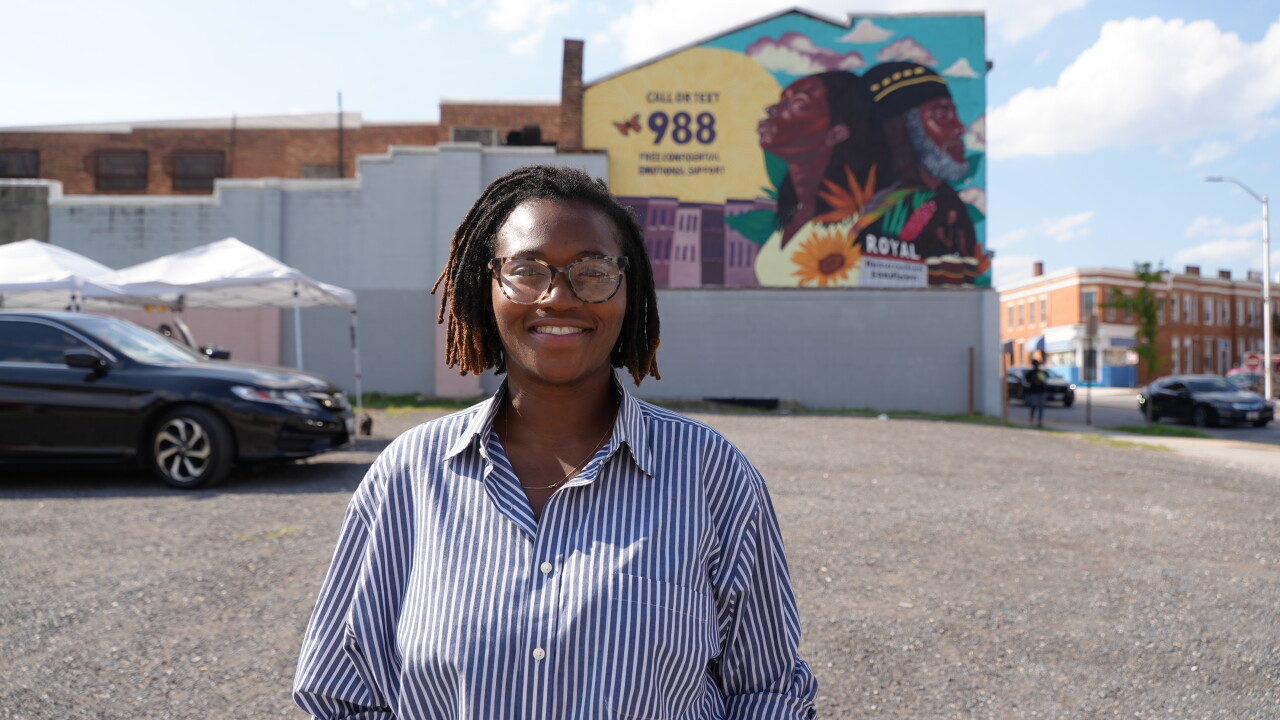 Yewande Kotun Davis and her mural on Pennsylvania Ave