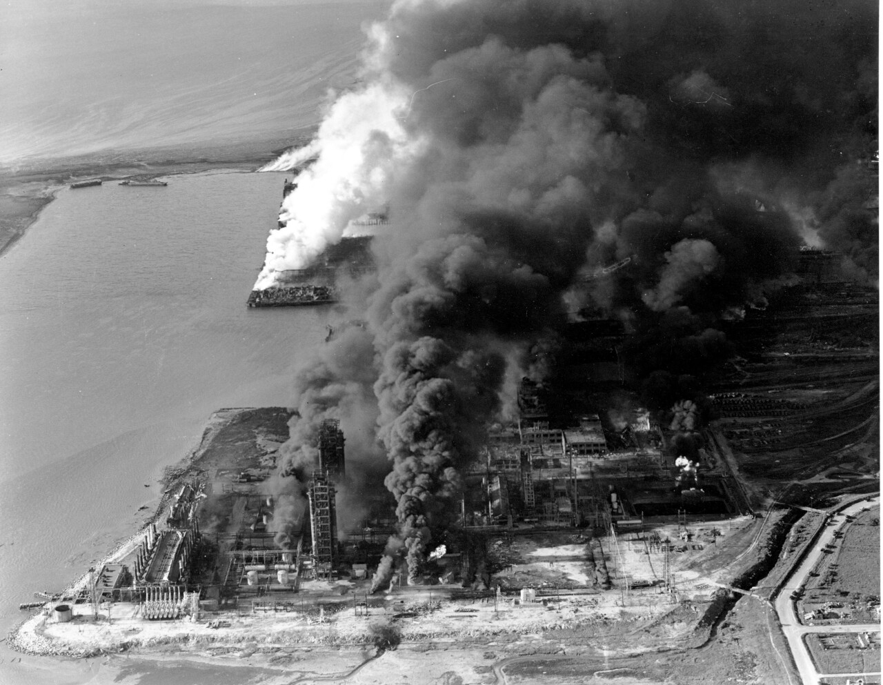 Refineries and oil storage tanks of the Monsanto chemical plant burn in the waterfront area in Texas City, Texas, on April 16, 1947. The disaster, caused by the explosion of the nitrate-laden French ship Grandcamp, caused 561 deaths. (AP Photo)