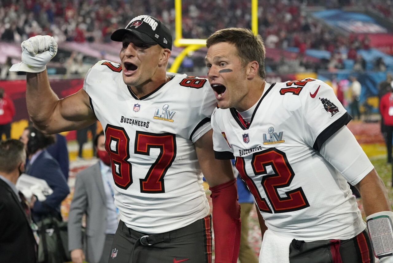 Tampa Bay Buccaneers QB Tom Brady and tight end Rob Gronkowski celebrate after winning Super Bowl LV