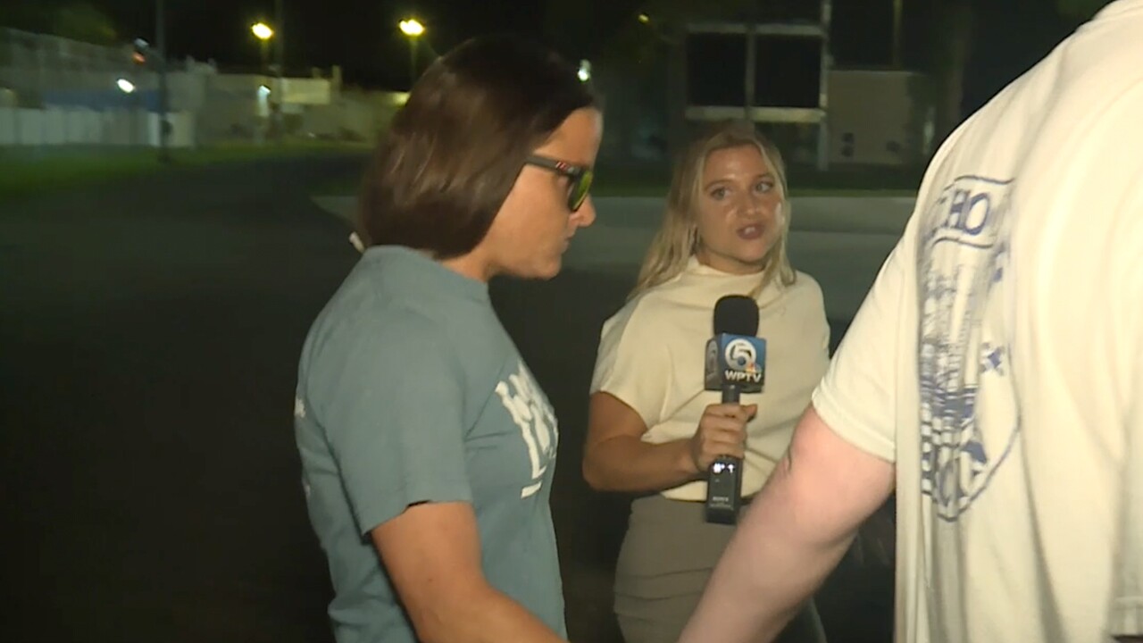 Nikki Camerlengo, the owner of Pawsitively Paradise in Palm City, walks out of the St. Lucie County Jail on June 19, 2024.jpg