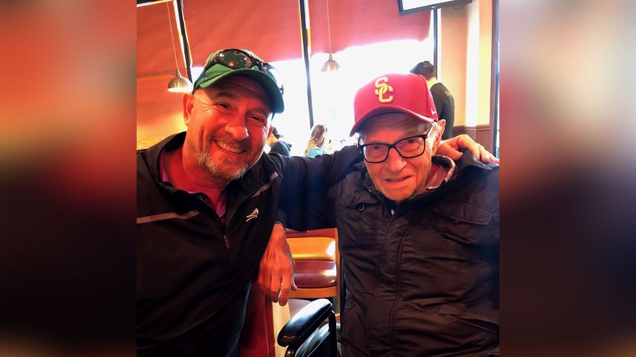 Larry King, Jr. and his father Larry King.