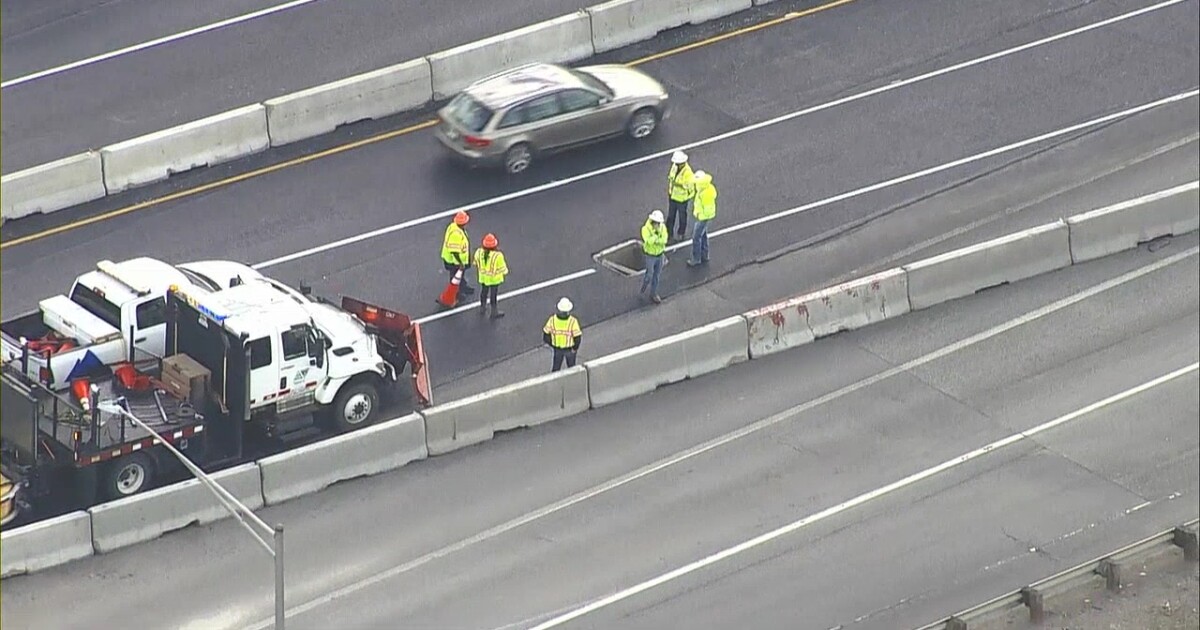 Eastbound I-70 lanes at Harlan blocked after construction grate falls into hole