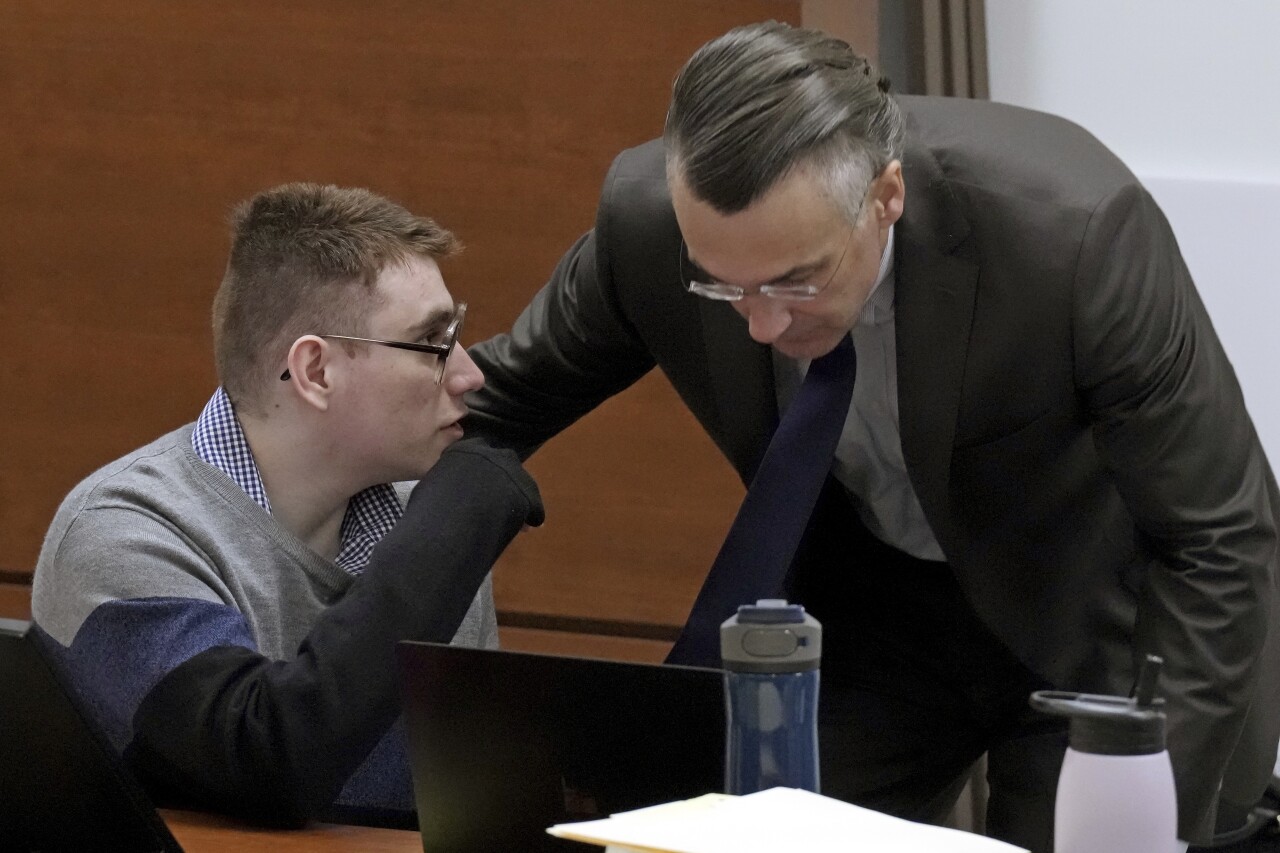 Nikolas Cruz speaks to capital defense attorney Casey Secor during break in jury selection for penalty phase of his murder trial, June 23, 2022