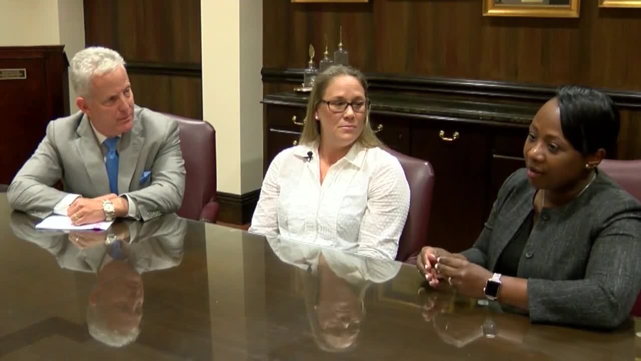 Heather Sitton with attorneys Gary Lesser and Danielle Sheriff